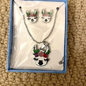 Brand new still in wrapper and box, stud earrings & lama necklace.. so cute!